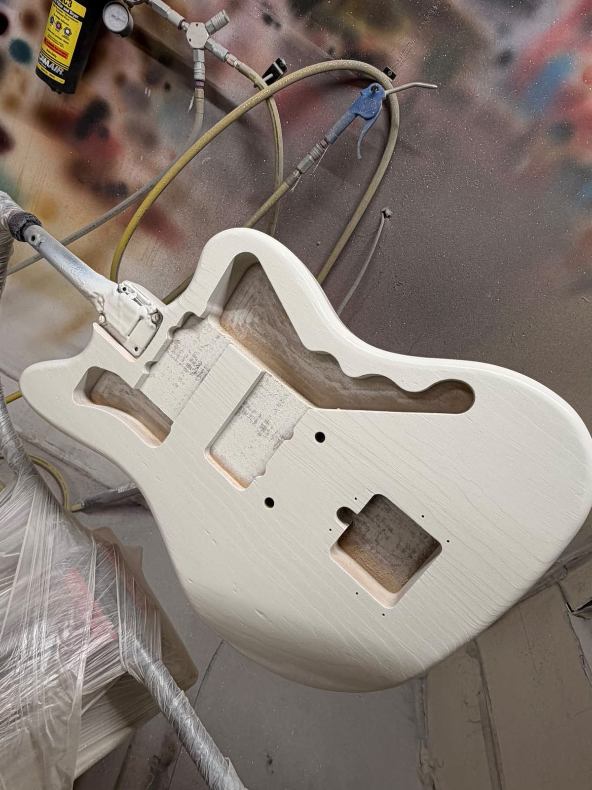 Guitar body in the paint booth